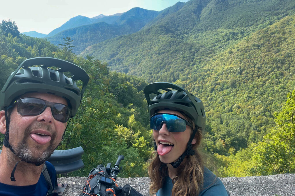 Two tired cyclists on the Trans Dinarica in Bosnia and Herzegovina.