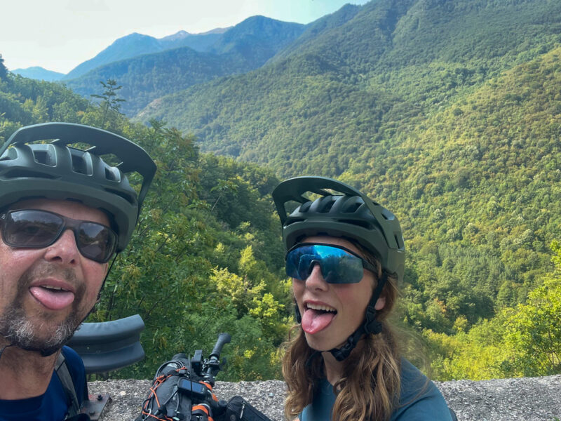 Two tired cyclists on the Trans Dinarica in Bosnia and Herzegovina.