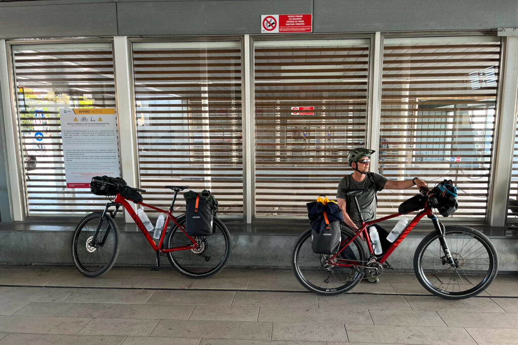 Two Trans Dinarica cyclists at the train station in Venice.